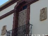 Casa de la Calle Real n 48. Escudos y balcn